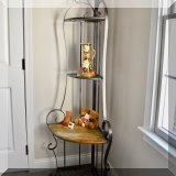 F38. Metal corner bakers rack. 